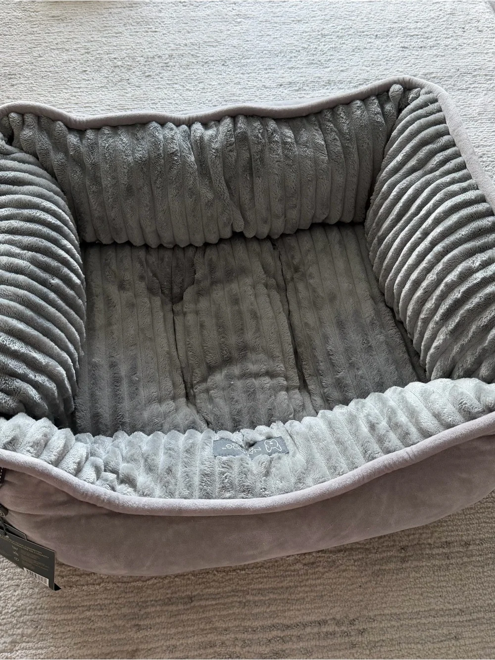 gray dog/cat bed with ribbed texture